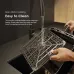Cleaning view of Oraimo SmartAirFryer non-stick grill washed under faucet for easy maintenance and convenience.