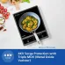 Front view of PHILIPS HD4944/00 Induction Cooker with pan and ingredients, highlighting 4KV surge protection for safe cooking.