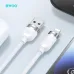 Close-up on the white BWOO BO-X315C USB-A and Lightning connectors with textured grips, lying next to a phone and tablet.