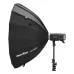 Angled side view of the black Godox AD-S85S parabolic softbox attached to a flash head on a stand.