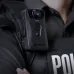 Close-up of a police vest with mounted Transcend DrivePro Body 40, showing GPS label and lens for law enforcement recording.