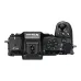 Top-down view of the black Nikon Z50 II mirrorless camera, showing the mode dial and top controls.