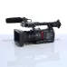 Angled view of the black Panasonic AG-CX350 professional camcorder on a white surface.