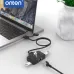 Desk setup view of the Onten OTN-UCA5311 5-in-2 USB Hub with LAN Adapter connected to a laptop for workspace use.