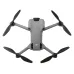 Overhead view of DJI Mini 5 Pro with sleek gray body and orange-tipped propellers, ideal for aerial photography.