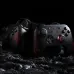 Two 8BitDo Ultimate 2C Black Myth: Wukong controllers on a dark rocky surface.