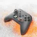 Top-down view of the Aolion AL-NS2268HD Gaming Controller with gray body, orange accents, and ergonomic button layout.