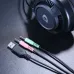 Close-up of the DAREU EH416s headset's cables: USB, pink 3.5mm (mic), and green 3.5mm (audio) connectors.