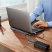 Desktop view of a laptop connected to the Baseus EliteJoy Gen2 12‑in‑1 Type‑C Hub used as a stand with multiple cables attached.