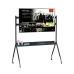 Dark gray Atomo TVSMS-001 mobile TV stand with a mounted screen displaying Netflix and a shelf with accessories.
