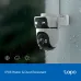 Outdoor view of TP-Link Tapo C545D WiFi Camera in rainy conditions emphasizing IP66 water and dust resistance.