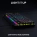 Angled view of Logitech PRO X TKL RAPID Keyboard on desk with vivid LIGHTSYNC RGB illumination across all keys.