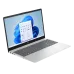 A light silver HP 15-fr0077TU laptop shown open at an angle, displaying the Windows 11 desktop on a bright screen.