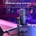 Desk setup view of Onikuma M730 Microphone connected via USB to laptop, with pop filter and purple-blue gaming lights.