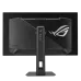 A rear view of the black ASUS ROG Strix OLED XG27ACDMS monitor, showing the geometric design, stand, and large white illuminated ROG logo.