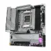 Gigabyte B650M AORUS Elite AX ICE motherboard top view with AM5 socket, DDR5 RAM slots, and large heatsinks