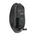 Bottom view of the Verbatim Dual Mode Wireless Mouse showing its battery compartment, sensor, and USB receiver slot.
