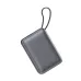 A sleek, matte grey rectangular power bank with rounded edges and a built-in braided carrying strap, shown floating against a white background.