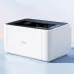 Angled view of Deli P1820W Printer with black top panel, paper output slot, and control buttons on smooth surface.