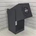 Front angled view of Xiaomi Wanbo Cube 2 Pro Projector showing square lens and open-frame design on wooden surface.
