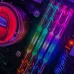 AITC Kingsman RGB 8GB DDR4 RAM sticks glowing with vibrant RGB lighting on a gaming motherboard setup