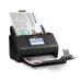 Epson WorkForce ES-580W document scanner in use, with documents loaded in the ADF and a scanned document in the output tray.