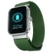 A silver smartwatch with a dark green woven nylon band. Its screen shows a glowing blue battery icon and 