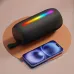 Black cylindrical BWOO BO-BS86 portable speaker with a rainbow light bar, next to a smartphone.