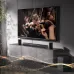 Living room setup view of the F&D HT‑500DA 5.1 Bluetooth Home Theater Speaker placed below a wall‑mounted TV.