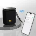 Monster Atomic Pebble Bluetooth Speaker displayed beside a smartphone illustrating Bluetooth pairing.