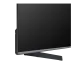 Close-up bottom corner view of Haier H100S90FUX TV showing sleek bezel and angular metallic stand for stability.