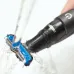 Feature view of Philips BG1025/15 Trimmer head rinsed under running water, showcasing waterproof and easy-clean design.