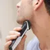 Side view of Philips MG3721/65 Trimmer used to trim facial hair with firm grip and clean edge control.