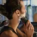 Lifestyle view of Philips X3021/00 Shaver used with shaving cream on cheek, highlighting smooth wet shave performance.